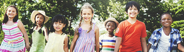 Smiling children in a row, Abour us banner